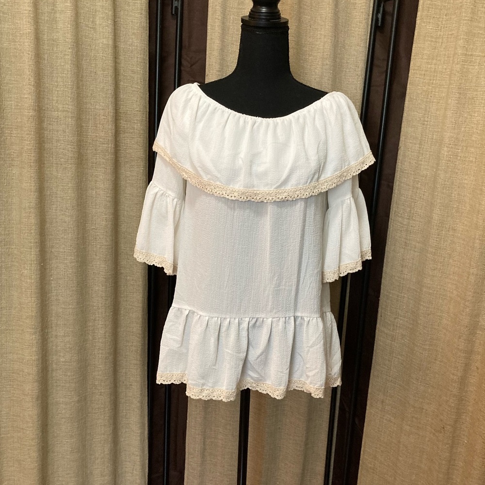 Shirt by mirror image. Cream color with crochet on top and bottom and sleeves.